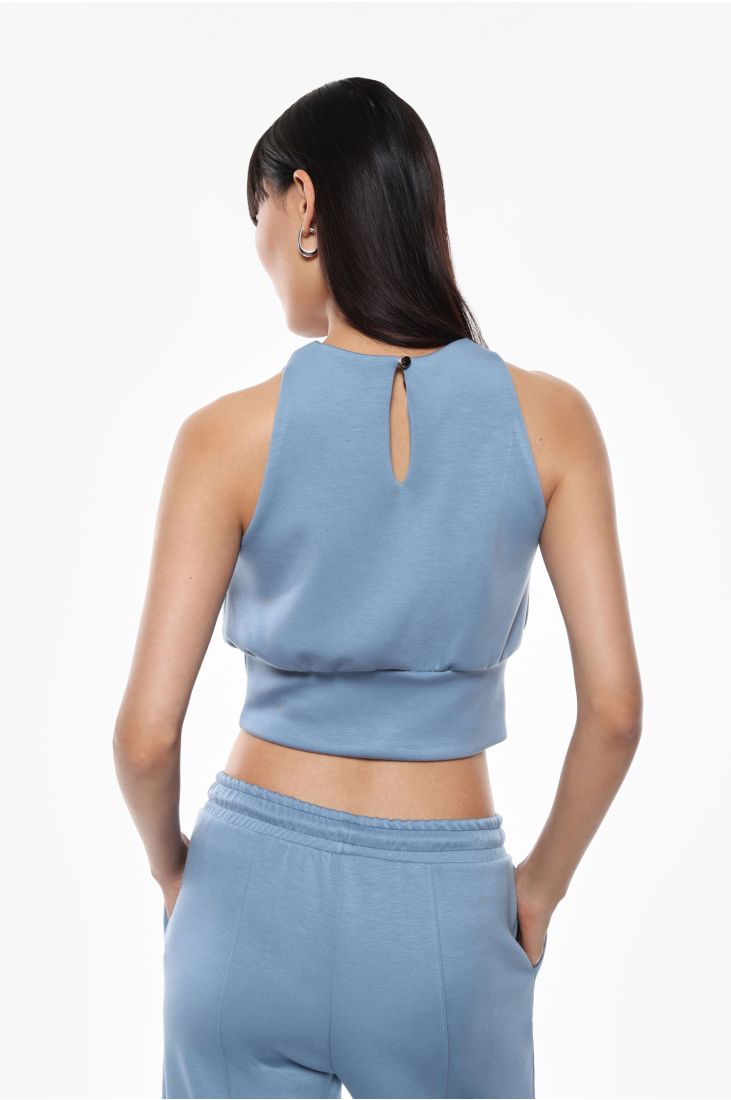 Sleeveless top with halter neck