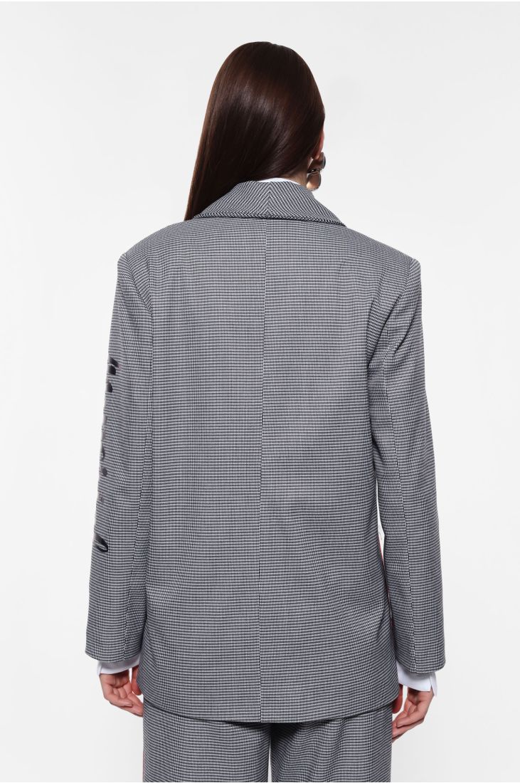 Houndstooth blazer with piping and printed sleeve