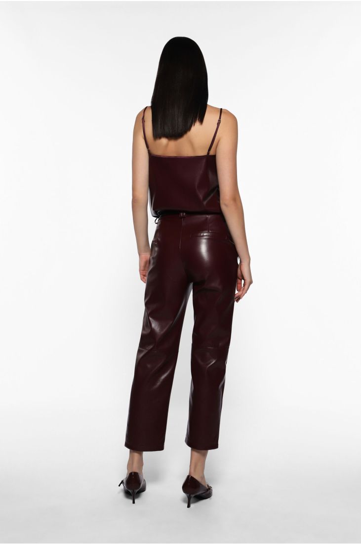 Trousers with glossy finish