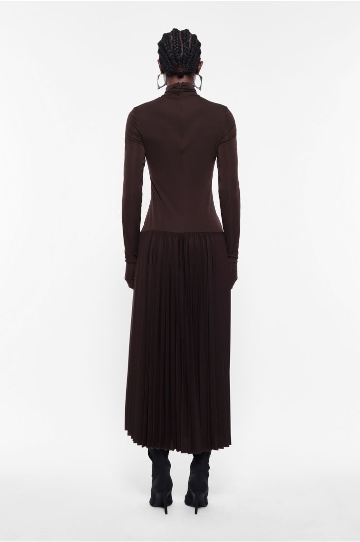 Long dress with turtleneck and pleated skirt